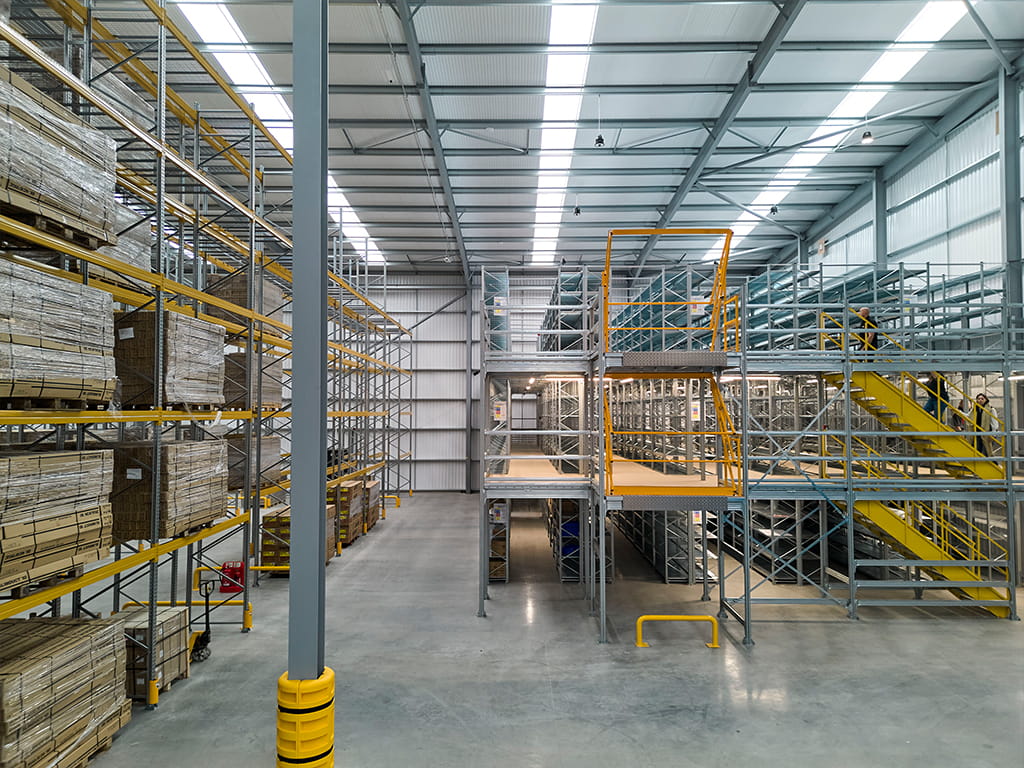 Industrial multi-tier shelving installation and pallet racking