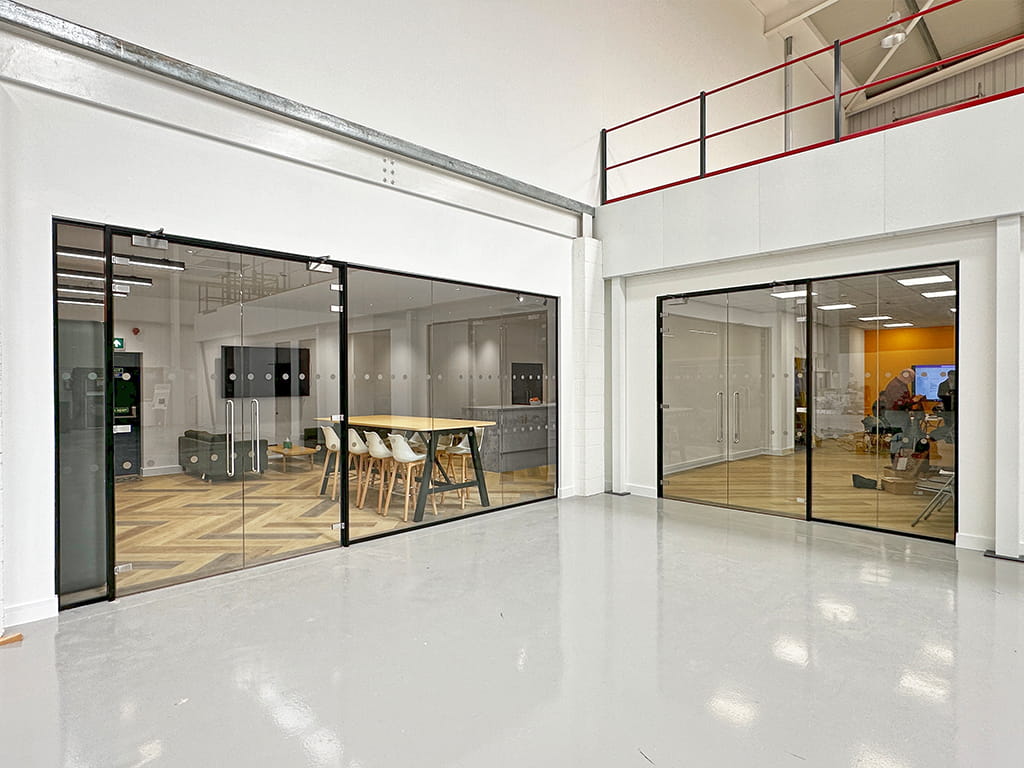 Warehouse glass partitioned office spaces